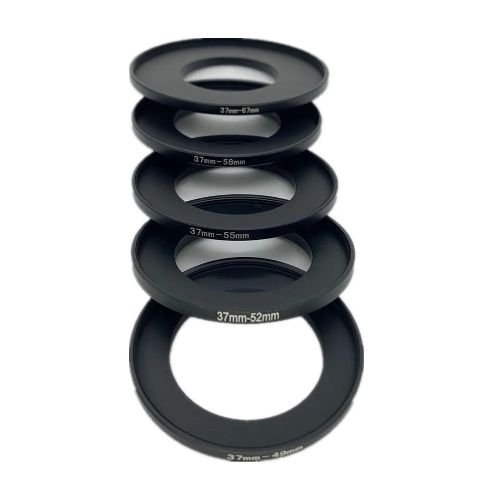 Five black 37mm step-up adapter rings stacked, engraved 37-49mm up to 37-67mm