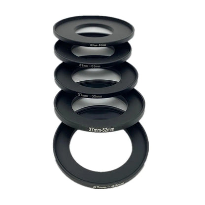 Five black 37mm step-up adapter rings stacked, engraved 37-49mm up to 37-67mm