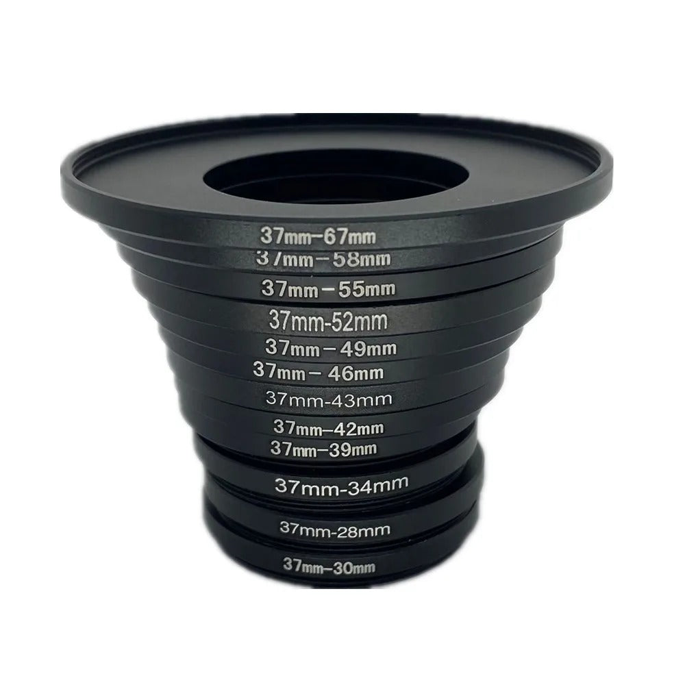 Stack of black 37mm step-up and step-down adapter rings with engraved sizes from 37-28mm to 37-67mm