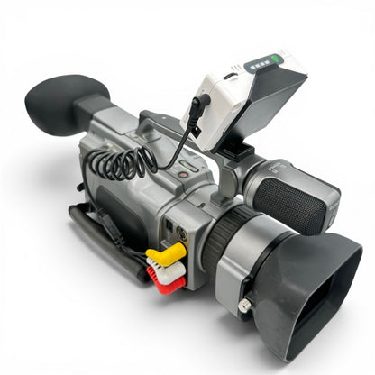 ImmersionRC PowerPlay DVR mounted on a Sony VX-series MiniDV camcorder, connected via the 3-RCA A/V cable, rear angle view