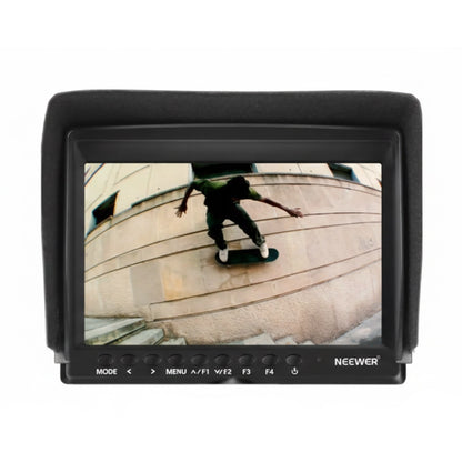 7-inch camera monitor displaying a person skateboarding, with 'Neewer' branding.