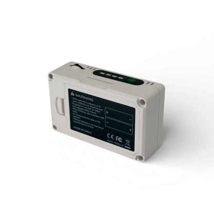 ImmersionRC PowerPlay DVR battery compartment door, showing the warning label for 2x 18500 Li-ion cells